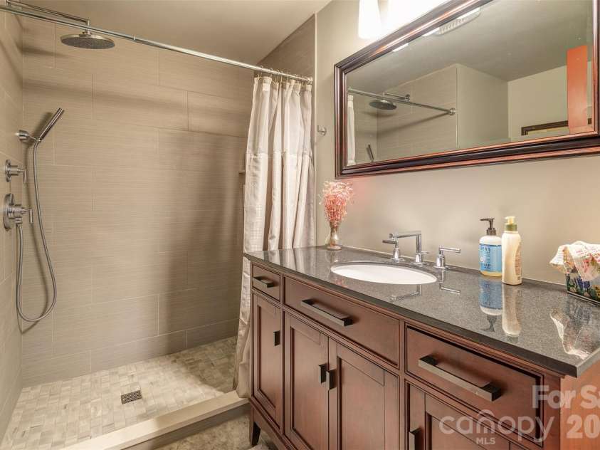 64 Greenridge Road, Weaverville, NC 28787.  MLS# CAR4420101, YatesRealty ID 48748. Lower level full bathroom