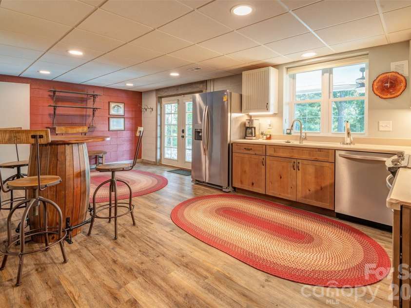 64 Greenridge Road, Weaverville, NC 28787.  MLS# CAR4420101, YatesRealty ID 48748. Lower level furnished apartment