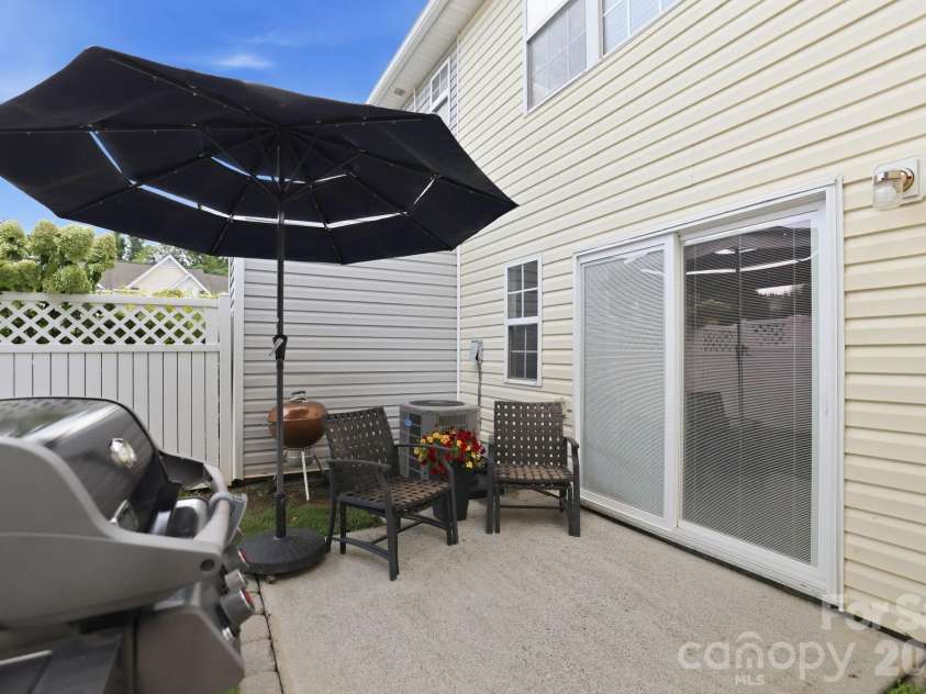 229 Primrose Walk, Fort Mill, SC 29715.  MLS# CAR4419579, YatesRealty ID 48753. Rear patio