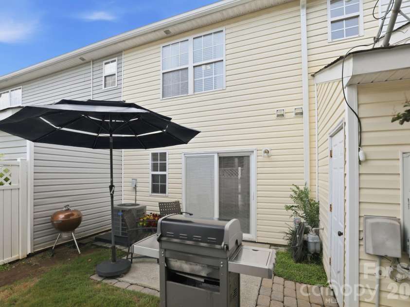 229 Primrose Walk, Fort Mill, SC 29715.  MLS# CAR4419579, YatesRealty ID 48753. Rear patio