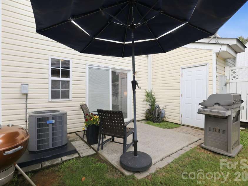 229 Primrose Walk, Fort Mill, SC 29715.  MLS# CAR4419579, YatesRealty ID 48753. Rear patio