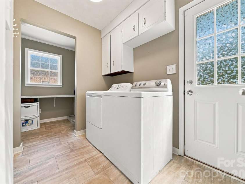 4948 Betty Drive, Hickory, NC 28601.  MLS# CAR4419644, YatesRealty ID 48758. Large laundry room and storage room
