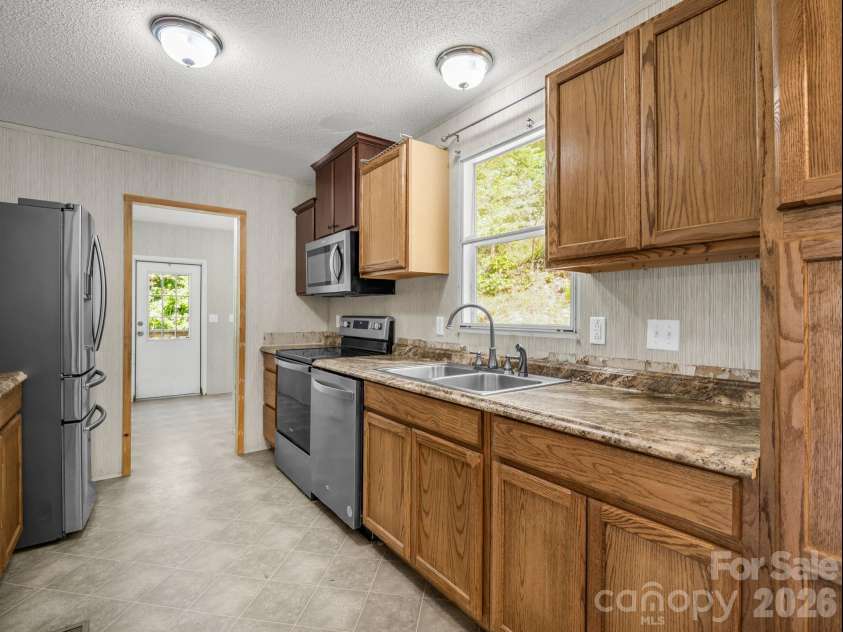 557 Sutton Mountain Ridge, Pisgah Forest, NC 28768.  MLS# CAR4419858, YatesRealty ID 48759. 