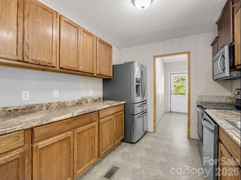 557 Sutton Mountain Ridge, Pisgah Forest, NC 28768.  MLS# CAR4419858, YatesRealty ID 48759. 