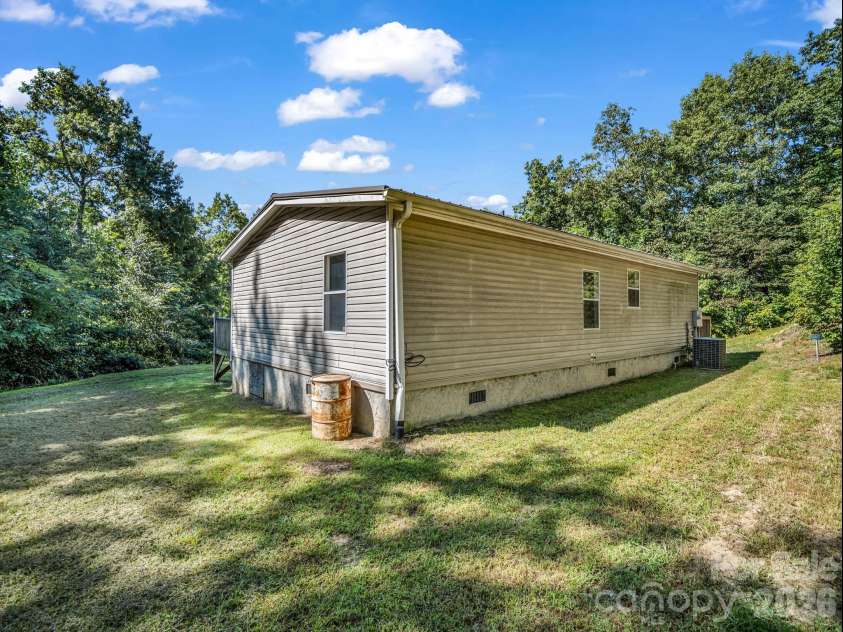 557 Sutton Mountain Ridge, Pisgah Forest, NC 28768.  MLS# CAR4419858, YatesRealty ID 48759. 