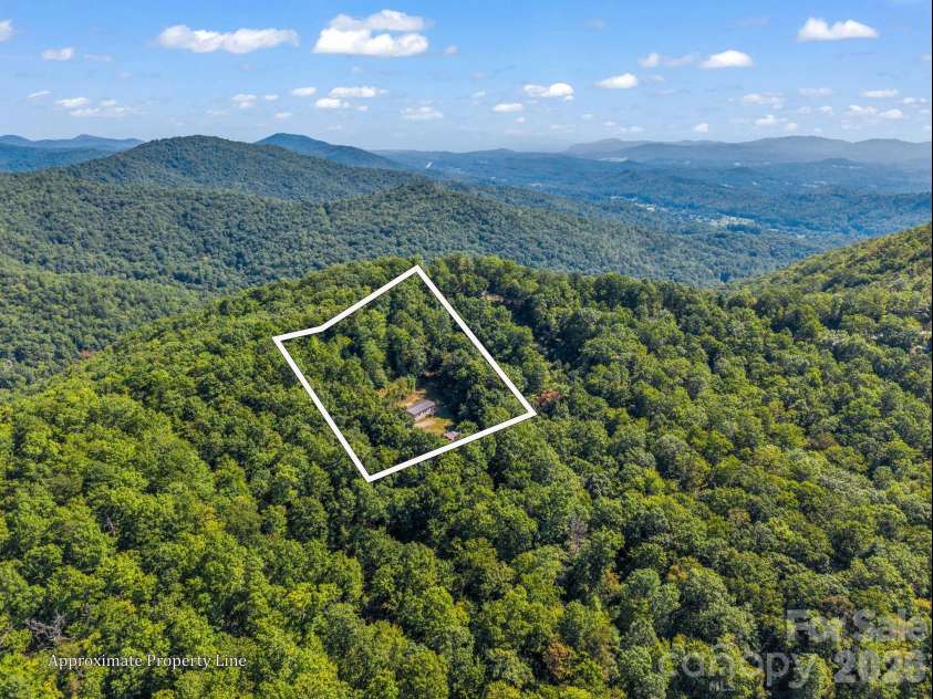 557 Sutton Mountain Ridge, Pisgah Forest, NC 28768.  MLS# CAR4419858, YatesRealty ID 48759. 