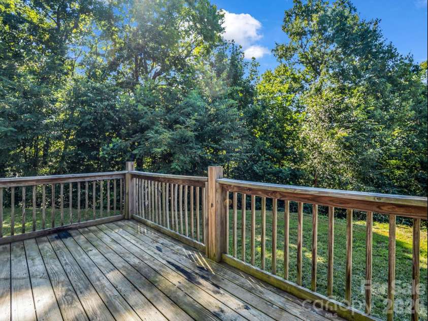 557 Sutton Mountain Ridge, Pisgah Forest, NC 28768.  MLS# CAR4419858, YatesRealty ID 48759. Large Front Deck