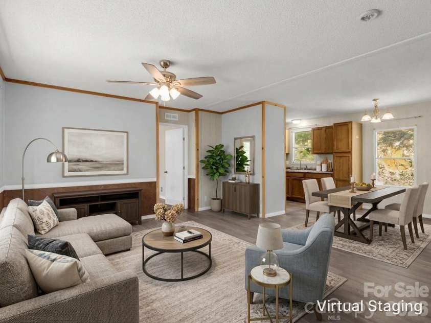 557 Sutton Mountain Ridge, Pisgah Forest, NC 28768.  MLS# CAR4419858, YatesRealty ID 48759. Living Room Virtually Staged