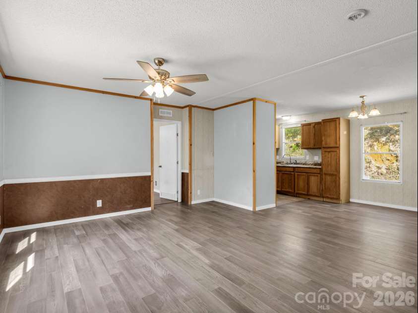 557 Sutton Mountain Ridge, Pisgah Forest, NC 28768.  MLS# CAR4419858, YatesRealty ID 48759. Open Living/Dining Area