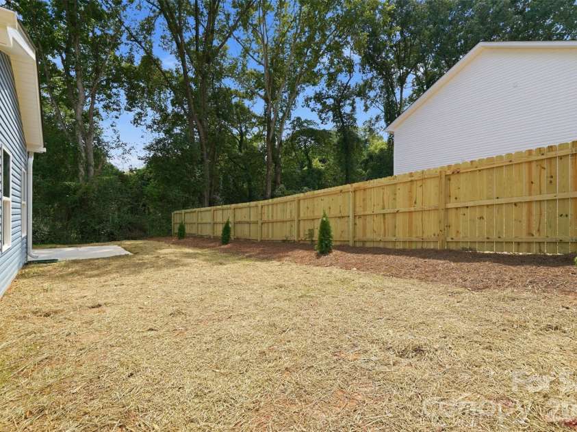 101 Swink Street, Concord, NC 28027.  MLS# CAR4420654, YatesRealty ID 48760. Backyard