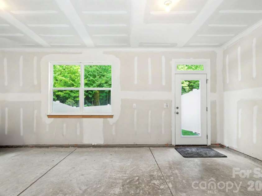 10307 Glenmere Creek Circle, Charlotte, NC 28262.  MLS# CAR4420962, YatesRealty ID 48765. Additional garage space.