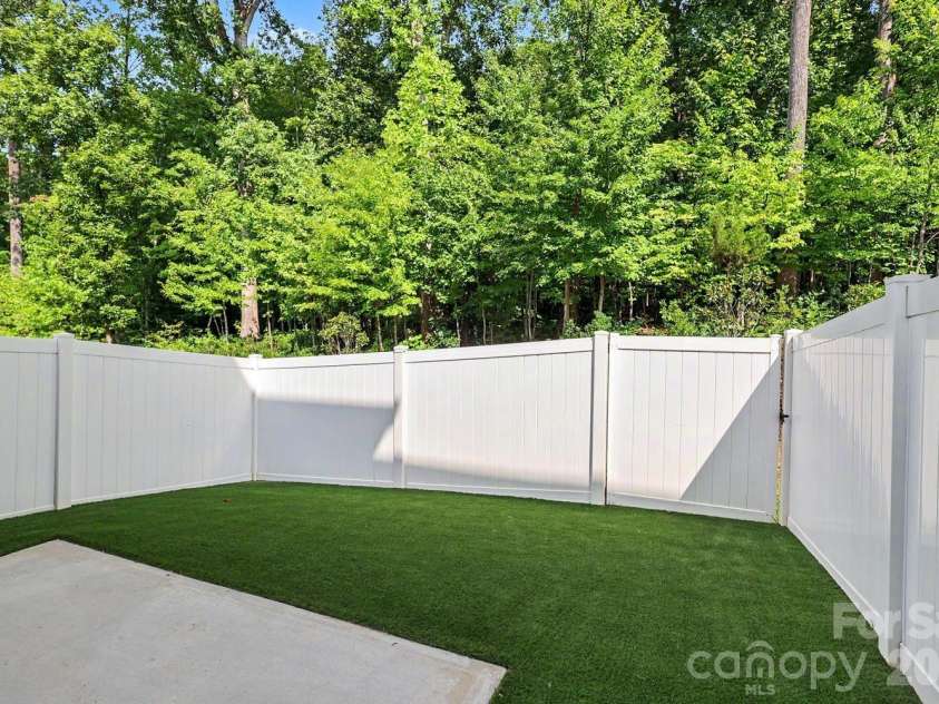10307 Glenmere Creek Circle, Charlotte, NC 28262.  MLS# CAR4420962, YatesRealty ID 48765. Fenced in turf back yard.
