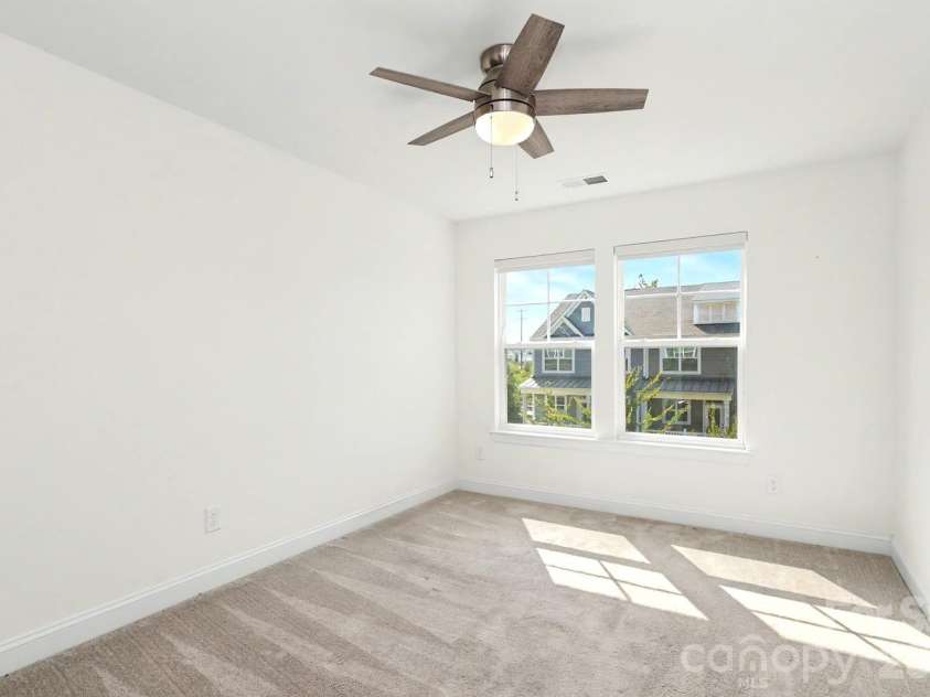 10307 Glenmere Creek Circle, Charlotte, NC 28262.  MLS# CAR4420962, YatesRealty ID 48765. Third floor guest bedroom.