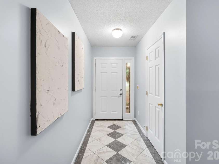 2819 Cedar Chase Drive, Matthews, NC 28105.  MLS# CAR4420001, YatesRealty ID 48769. Front door entry