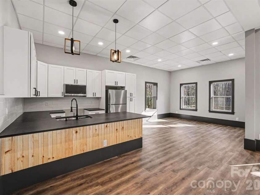 15200 August Lane, Charlotte, NC 28227.  MLS# CAR4350739, YatesRealty ID 4877. BASEMENT KITCHEN