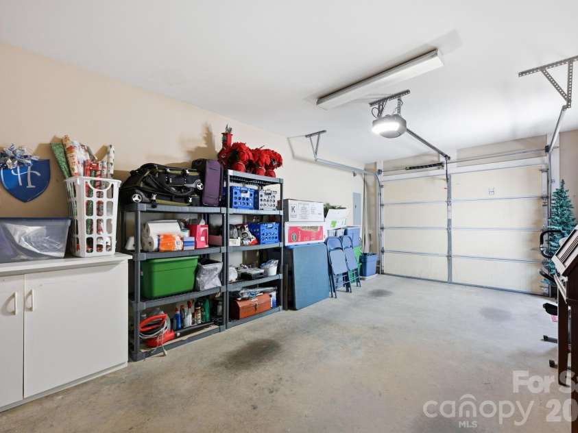 5962 Village Drive, Concord, NC 28027.  MLS# CAR4417673, YatesRealty ID 48771. Garage with storage