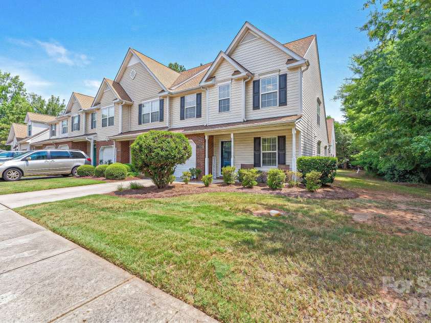 11319 Morgan Valley Lane, Charlotte, NC 28270.  MLS# CAR4418759, YatesRealty ID 48774. Fully Updated End Unit with Private Wood Facing Backyard!