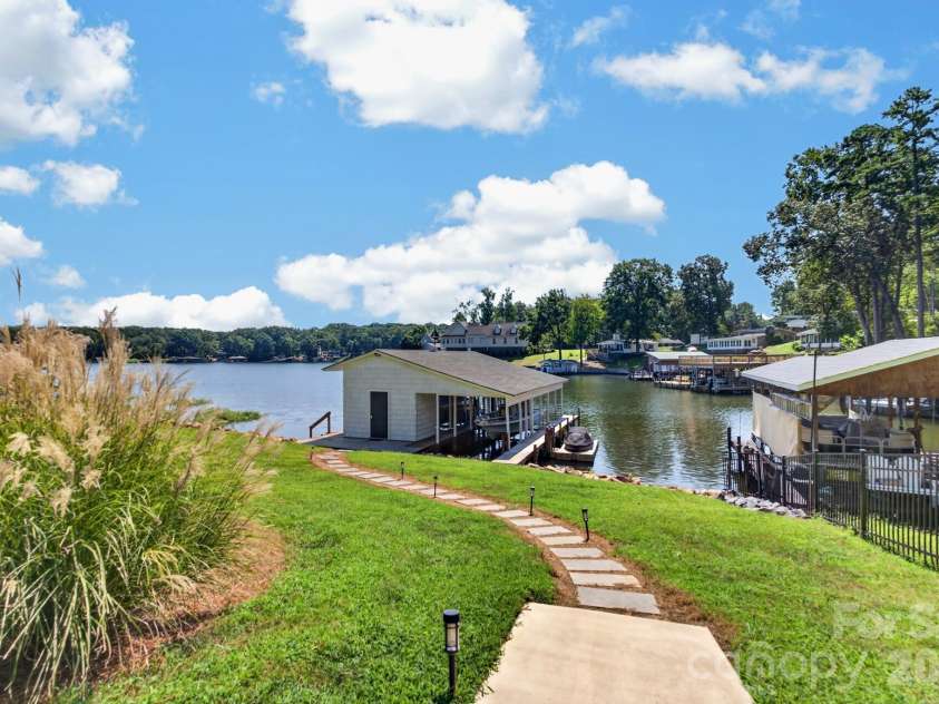 745 Anchor Road, Norwood, NC 28128.  MLS# CAR4419200, YatesRealty ID 48776. Nice walk down to boathouse