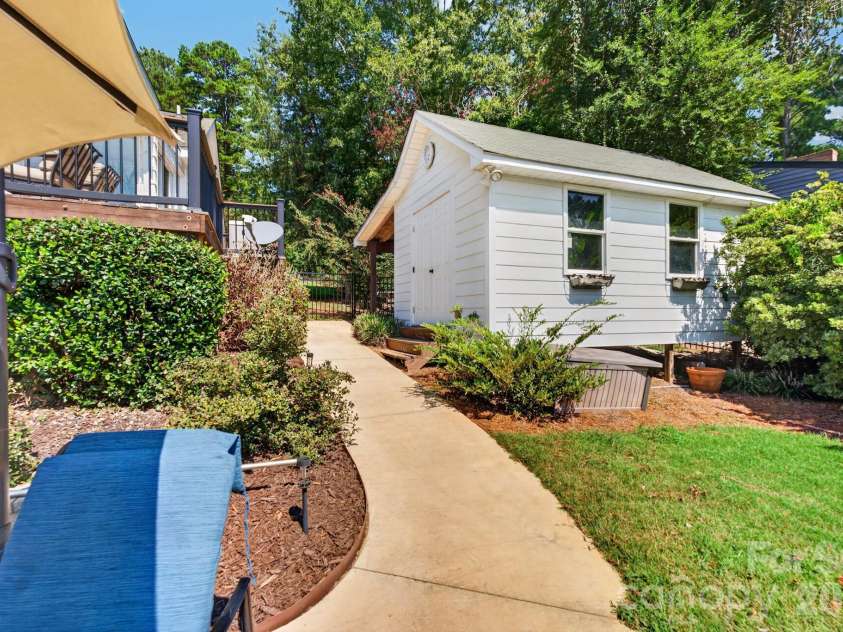745 Anchor Road, Norwood, NC 28128.  MLS# CAR4419200, YatesRealty ID 48776. Storage Shed with lean-to