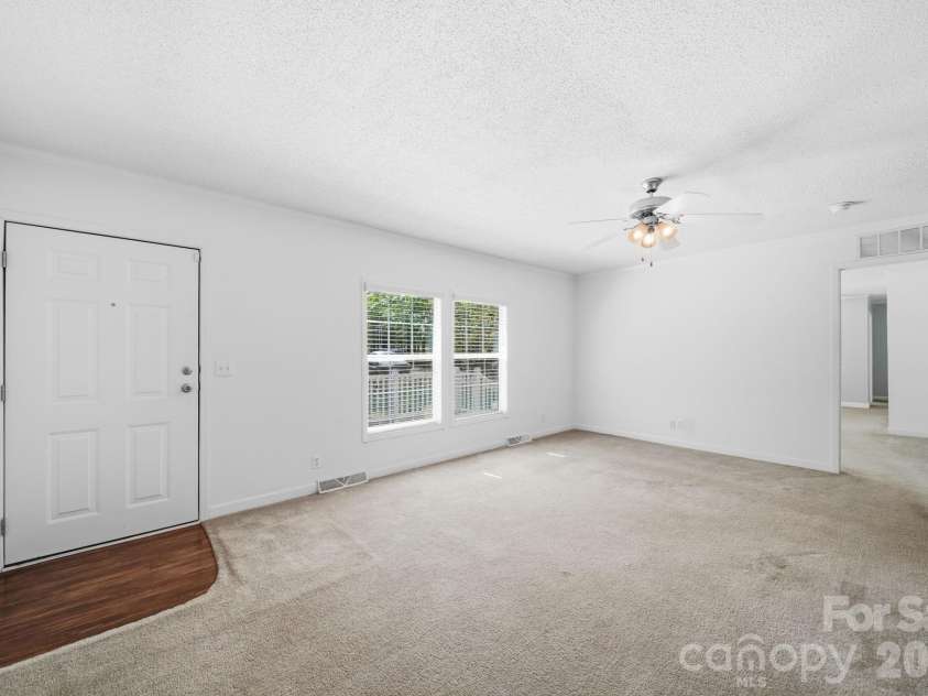 2006 Waxhaw Highway, Monroe, NC 28112.  MLS# CAR4419385, YatesRealty ID 48777. Living room.