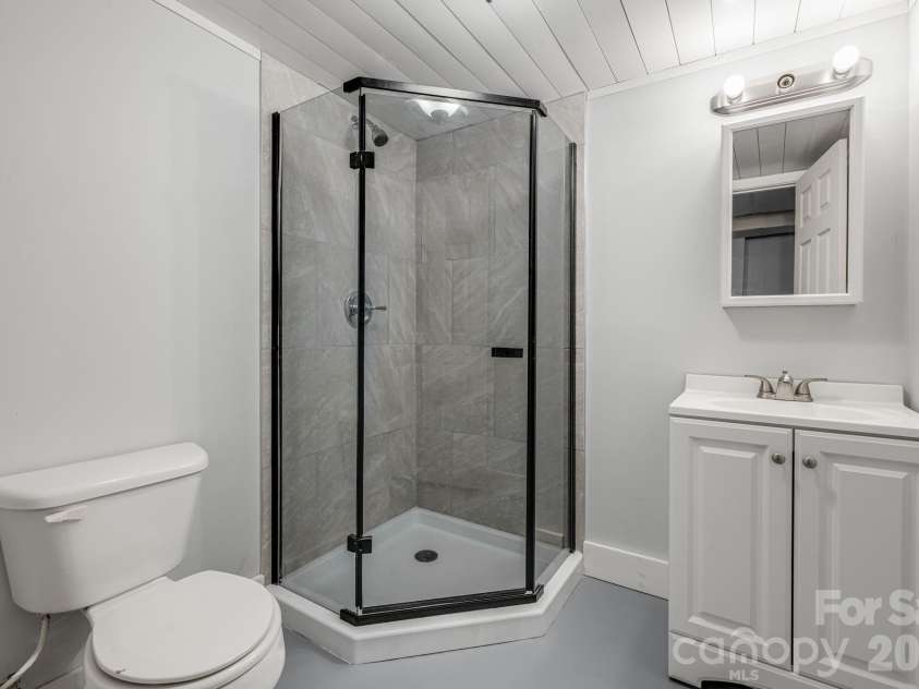25 Hickory Tree Road, Asheville, NC 28805.  MLS# CAR4418920, YatesRealty ID 48783. Basement bathroom