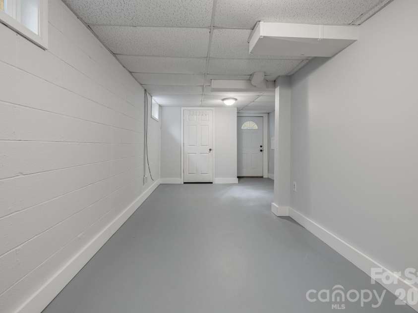 25 Hickory Tree Road, Asheville, NC 28805.  MLS# CAR4418920, YatesRealty ID 48783. Basement bedroom