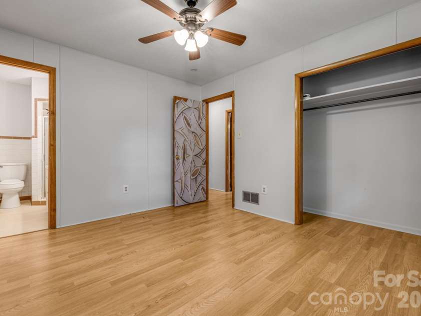 25 Hickory Tree Road, Asheville, NC 28805.  MLS# CAR4418920, YatesRealty ID 48783. Primary bedroom