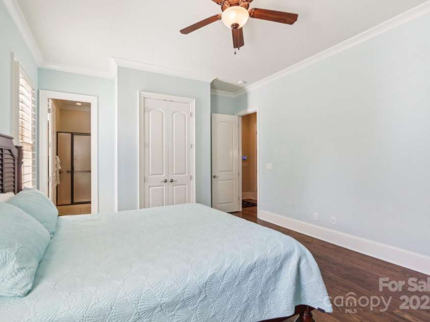 1322 Shinnecock Lane, Fort Mill, SC 29707.  MLS# CAR4239031, YatesRealty ID 4879. 2nd primary bedroom on the main level w/ hardwood floors, walk in closet & ensuite bath.