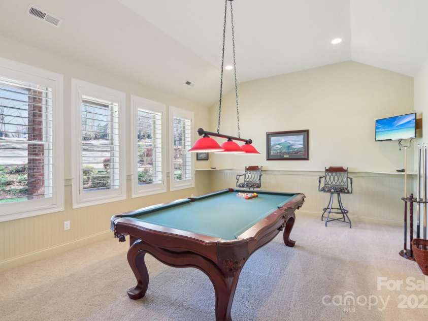 1322 Shinnecock Lane, Fort Mill, SC 29707.  MLS# CAR4239031, YatesRealty ID 4879. Billards room w/ light, drink shelving & bar counter, vaulted ceiling & recessed lighting.