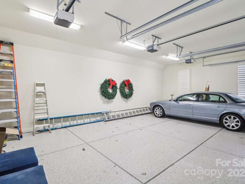 1322 Shinnecock Lane, Fort Mill, SC 29707.  MLS# CAR4239031, YatesRealty ID 4879. Epoxy floor, fresh paint, utility sink & oversized garage doors.