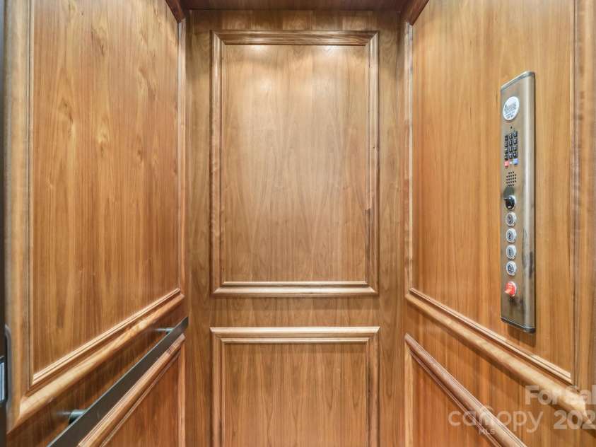 1322 Shinnecock Lane, Fort Mill, SC 29707.  MLS# CAR4239031, YatesRealty ID 4879. Hydraulic elevator w/ phone reaching all 3 levels.