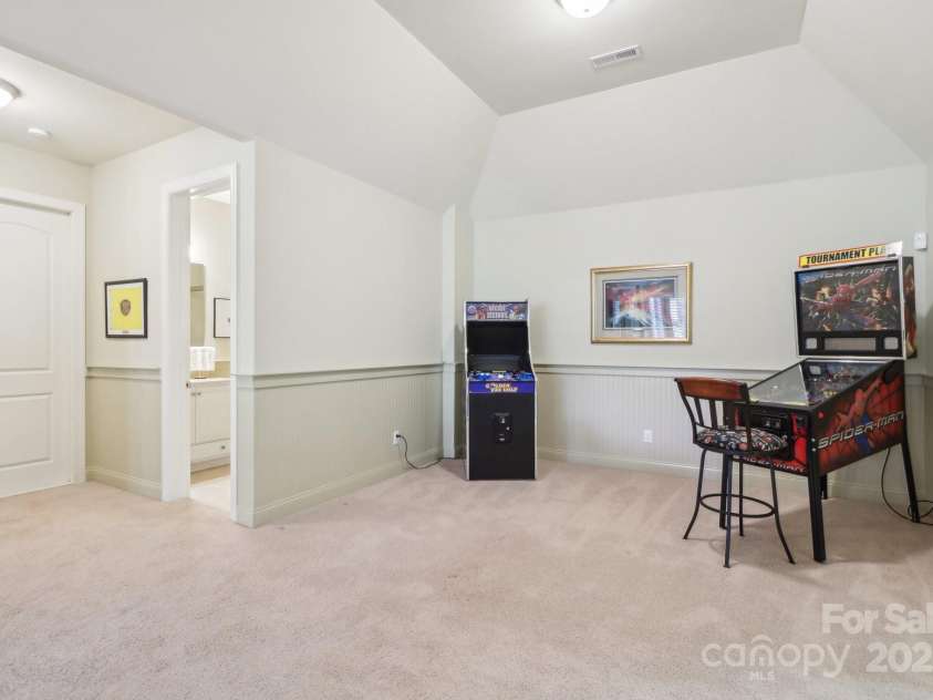 1322 Shinnecock Lane, Fort Mill, SC 29707.  MLS# CAR4239031, YatesRealty ID 4879. Pinball/arcade area.