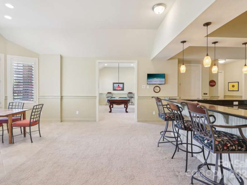 1322 Shinnecock Lane, Fort Mill, SC 29707.  MLS# CAR4239031, YatesRealty ID 4879. Plenting of dining, cards area & seating areas. The basement is perfect for multi-generational living.