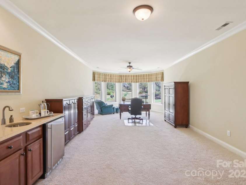 1322 Shinnecock Lane, Fort Mill, SC 29707.  MLS# CAR4239031, YatesRealty ID 4879. Rec room w/ fabulous views of the signature hole #15.