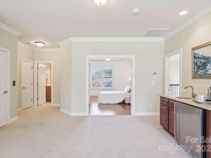 1322 Shinnecock Lane, Fort Mill, SC 29707.  MLS# CAR4239031, YatesRealty ID 4879. Wet bar off rec room w/ refrigerator & sink.