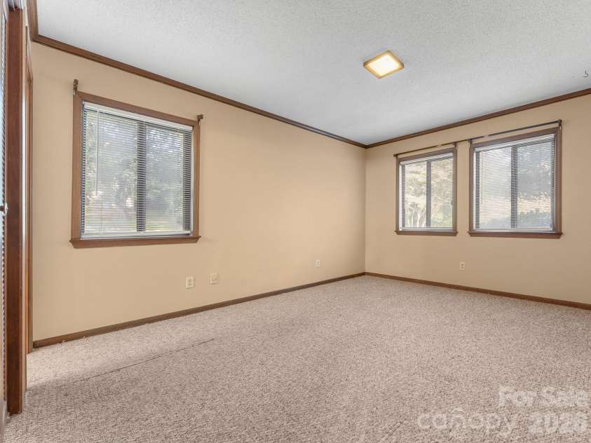 33 Lake Drive, Laurel Park, NC 28739.  MLS# CAR4414312, YatesRealty ID 48791. 