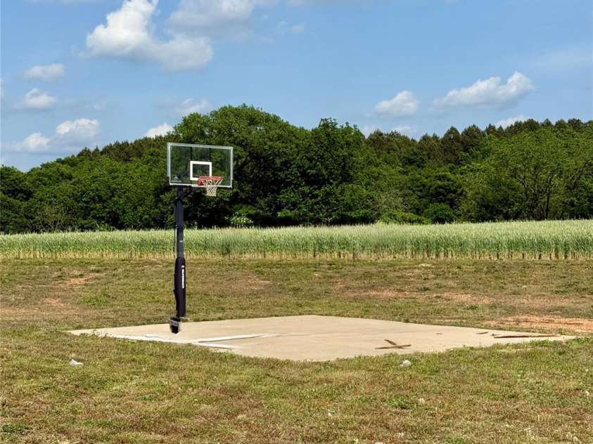 4048 Avis Way, Monroe, NC 28110.  MLS# CAR4253447, YatesRealty ID 488. Basketball court 