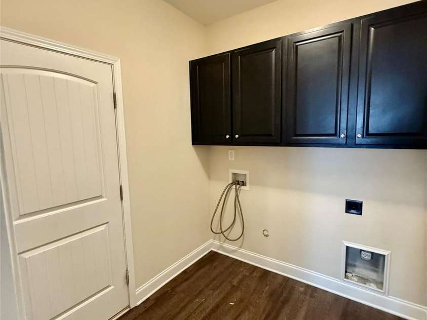 4048 Avis Way, Monroe, NC 28110.  MLS# CAR4253447, YatesRealty ID 488. Laundry at garage