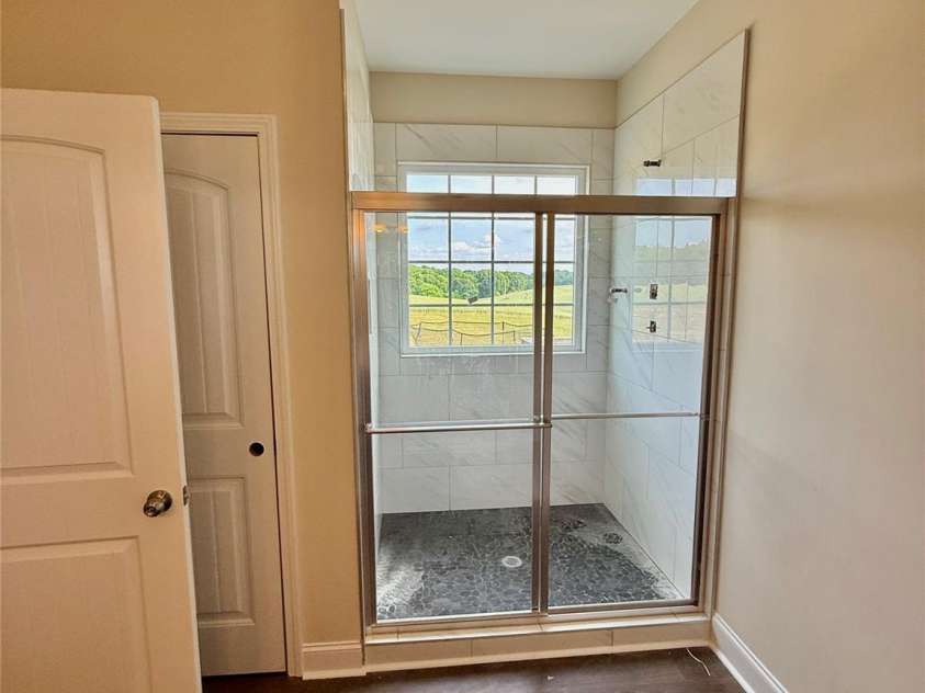 4048 Avis Way, Monroe, NC 28110.  MLS# CAR4253447, YatesRealty ID 488. Primary bathroom suite