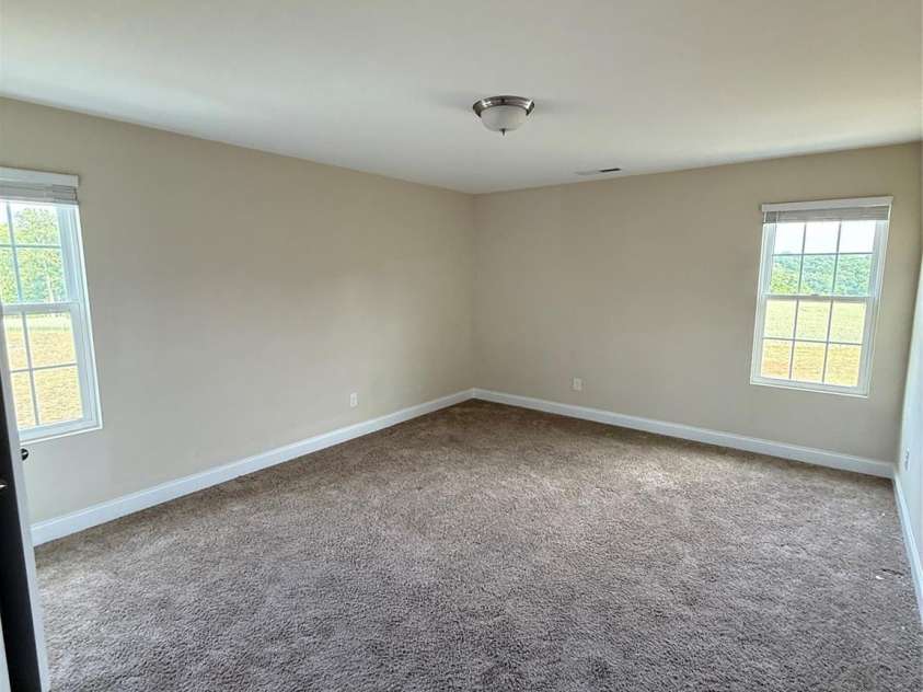 4048 Avis Way, Monroe, NC 28110.  MLS# CAR4253447, YatesRealty ID 488. Secondary bedroom