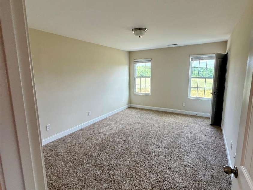 4048 Avis Way, Monroe, NC 28110.  MLS# CAR4253447, YatesRealty ID 488. Secondary bedroom