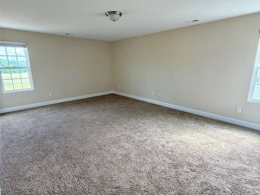 4048 Avis Way, Monroe, NC 28110.  MLS# CAR4253447, YatesRealty ID 488. Secondary bedroom