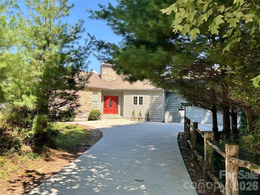 1228 Ugugu Drive, Brevard, NC 28712.  MLS# CAR4413645, YatesRealty ID 48800. 