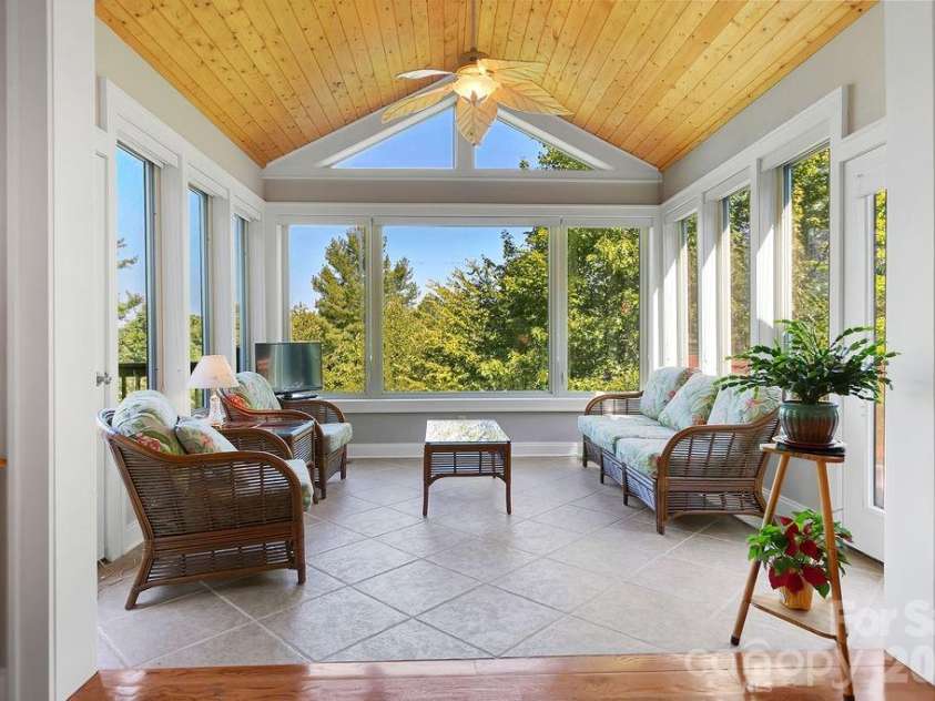 1228 Ugugu Drive, Brevard, NC 28712.  MLS# CAR4413645, YatesRealty ID 48800. Sunroom