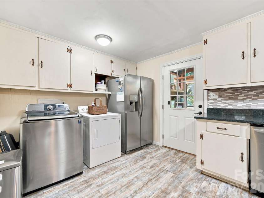 7704 Otts Circle, Stanley, NC 28164.  MLS# CAR4421199, YatesRealty ID 48801. Laundry area