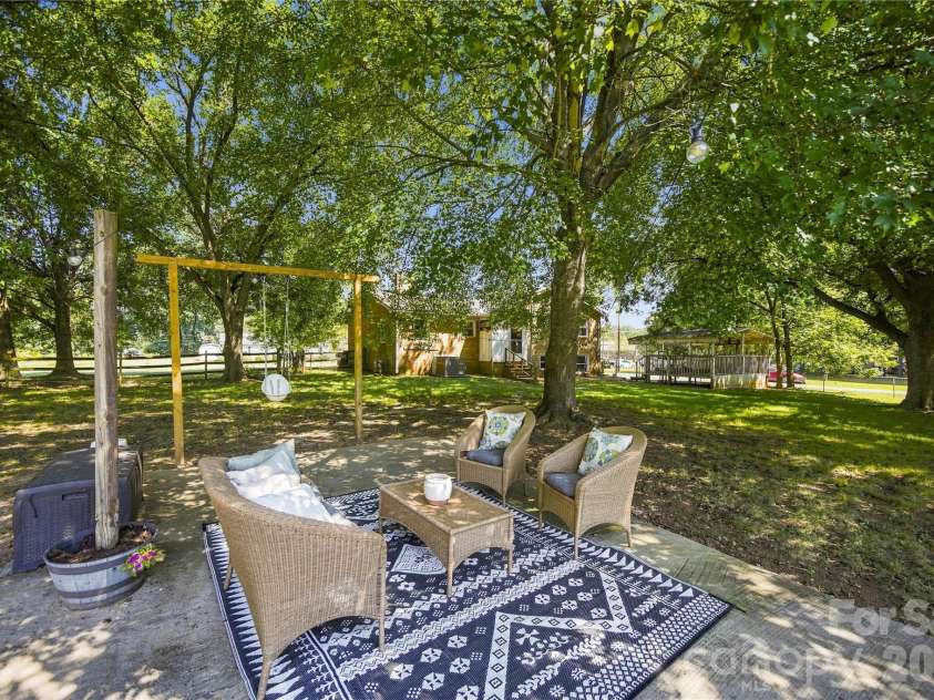 7704 Otts Circle, Stanley, NC 28164.  MLS# CAR4421199, YatesRealty ID 48801. Patio in large yard