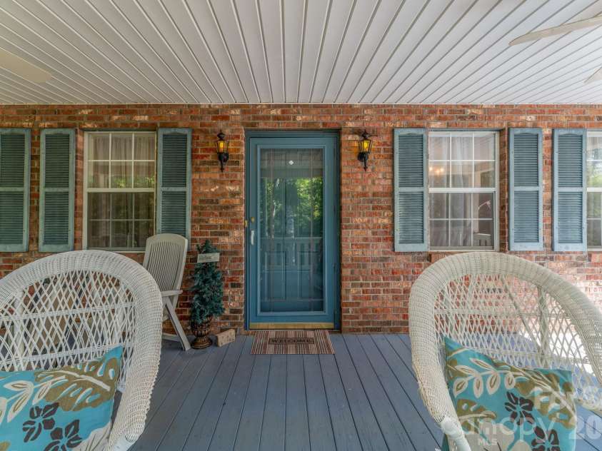 1886 Tanasee Gap Road, Balsam Grove, NC 28708.  MLS# CAR4421630, YatesRealty ID 48802. Front covered porch