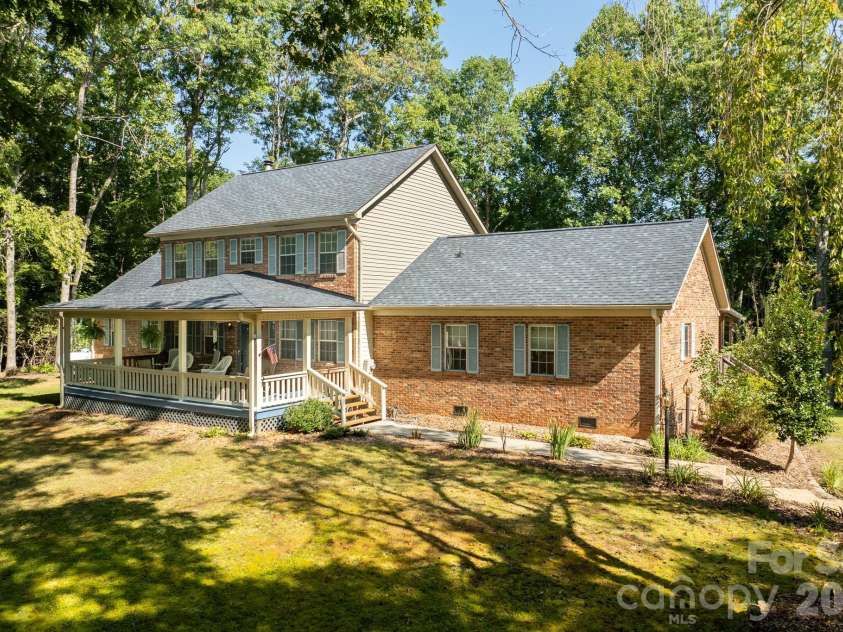 1886 Tanasee Gap Road, Balsam Grove, NC 28708.  MLS# CAR4421630, YatesRealty ID 48802. Front of home