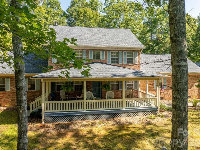 1886 Tanasee Gap Road, Balsam Grove, NC 28708.  MLS# CAR4421630, YatesRealty ID 48802. Front porch