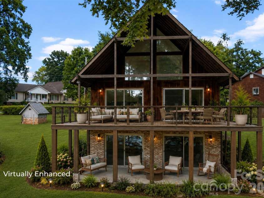 131 Baywatch Drive, Mooresville, NC 28117.  MLS# CAR4420132, YatesRealty ID 48806. Virtually enhanced back deck & basement walkout